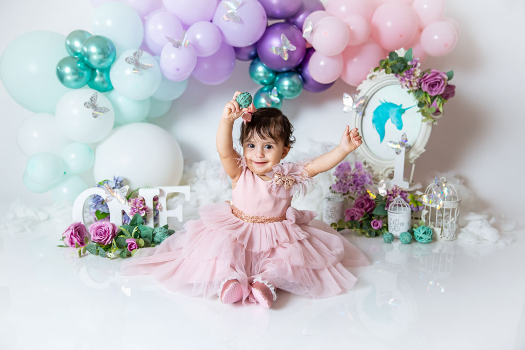 baby girl in unicorn  birthday decoration 