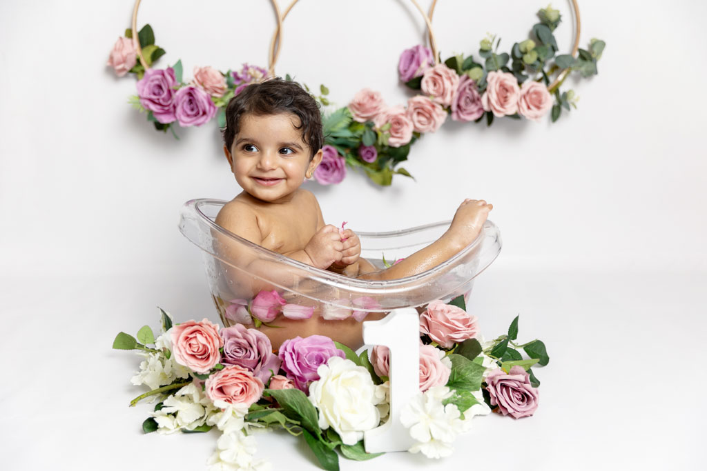 kids photoshoot for fist birthday baby girl bath