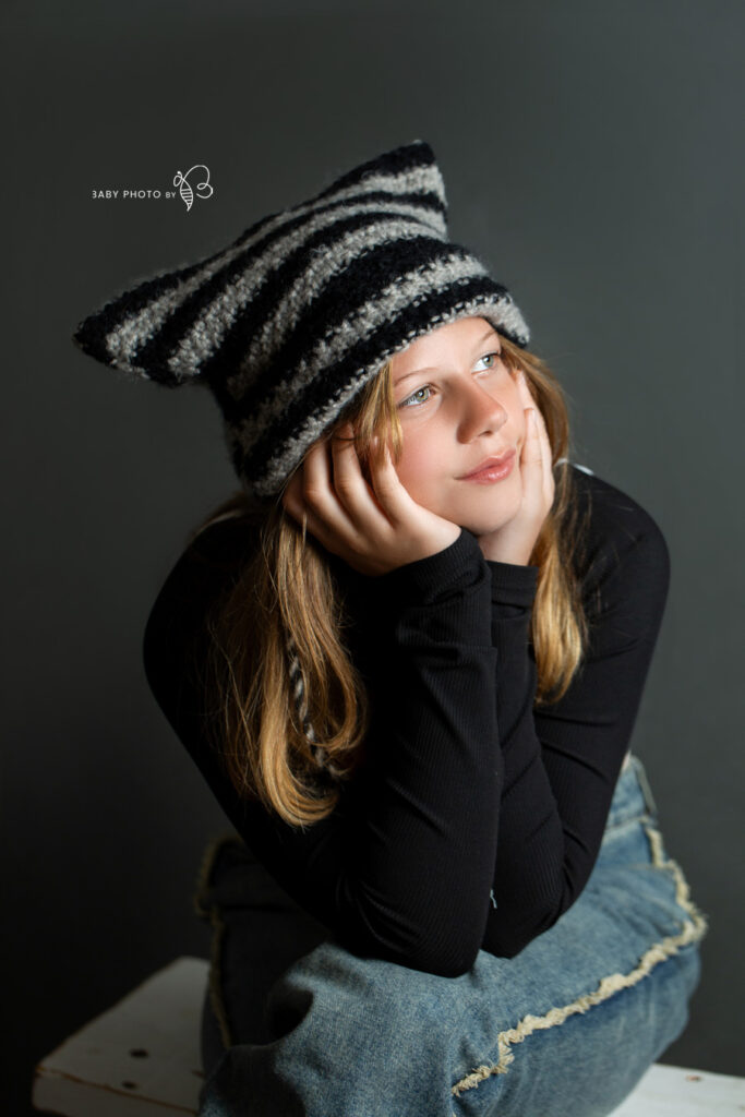 teenage girl with hat photo