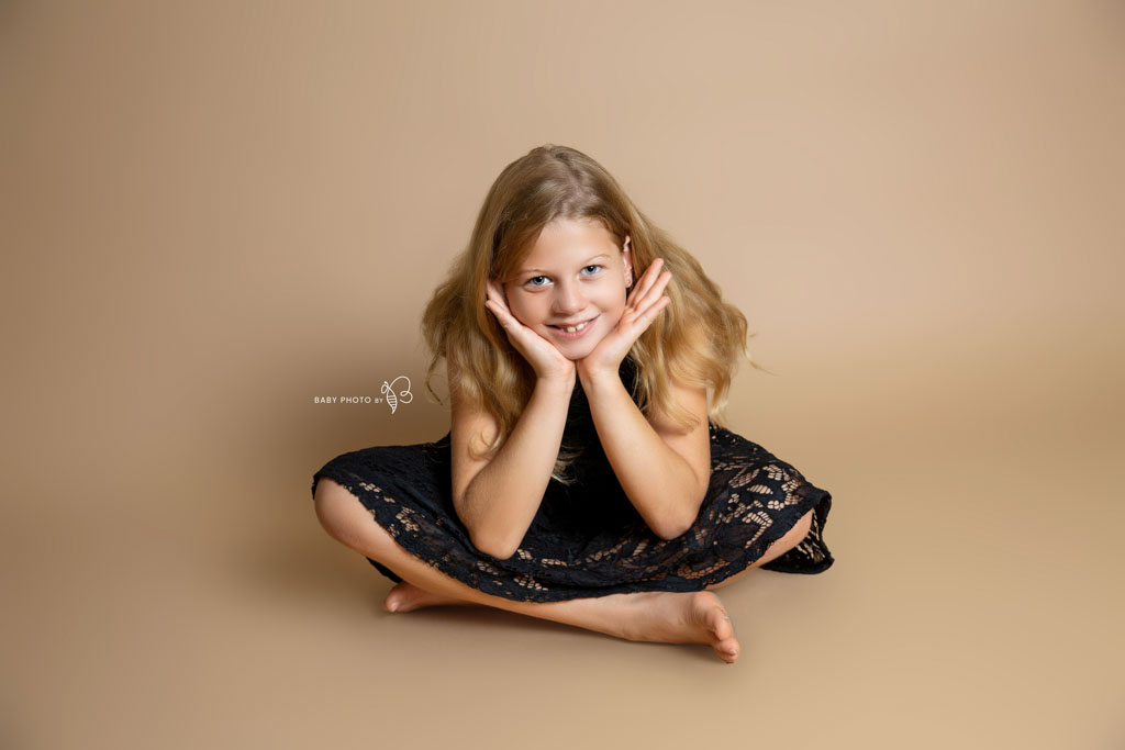 young girl photo on cream background