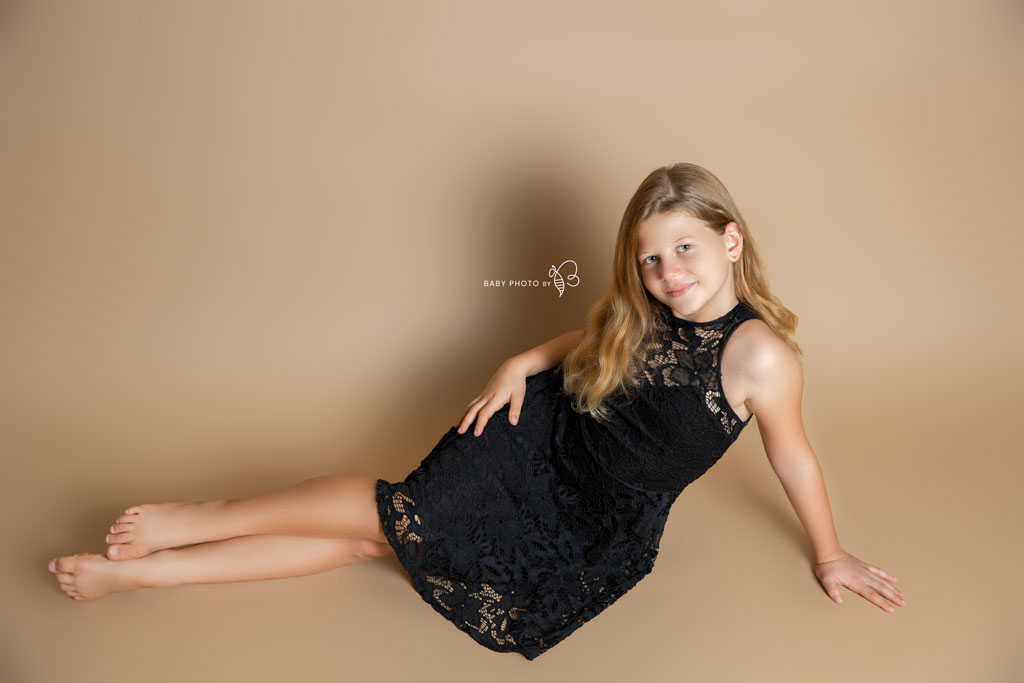 young girl photo on cream background