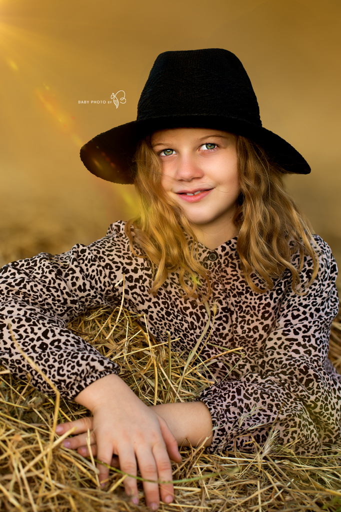 girl portrait with black hat outdoor